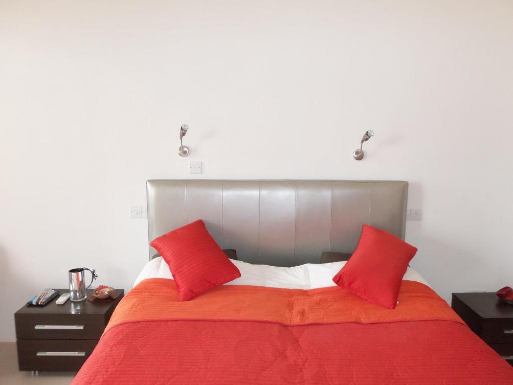 Postel nebo postele na pokoji v ubytování Beach Villa Pantheon