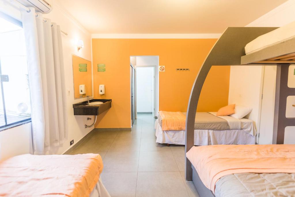 Postel nebo postele na pokoji v ubytování Concept Design Hostel & Suites