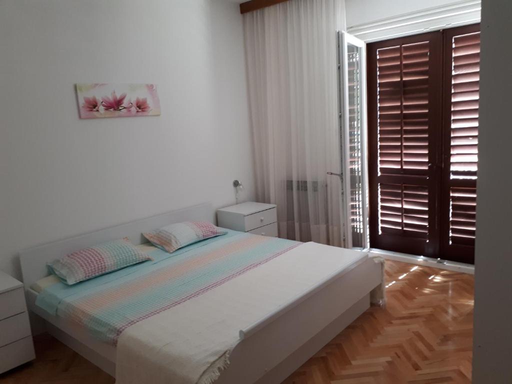 Voodi või voodid majutusasutuse Apartment Lily toas