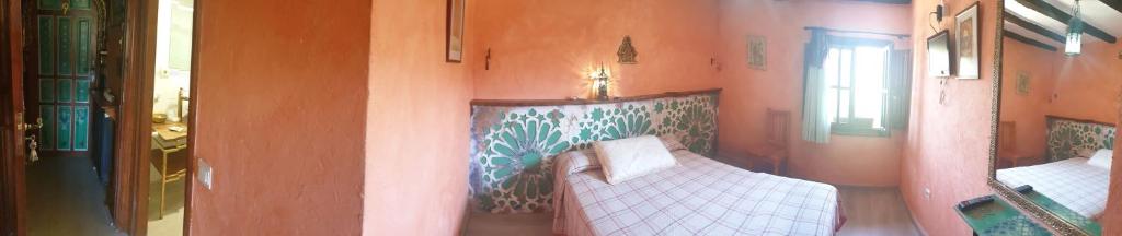 Postel nebo postele na pokoji v ubytování Hotel Rural Calatañazor