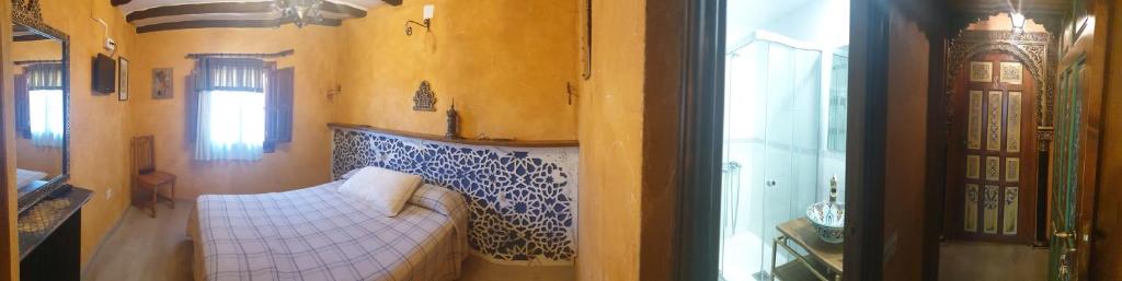 Postel nebo postele na pokoji v ubytování Hotel Rural Calatañazor