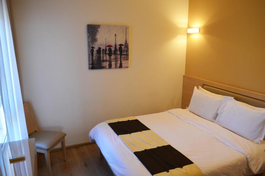 Postel nebo postele na pokoji v ubytování Nest 1 Hotel