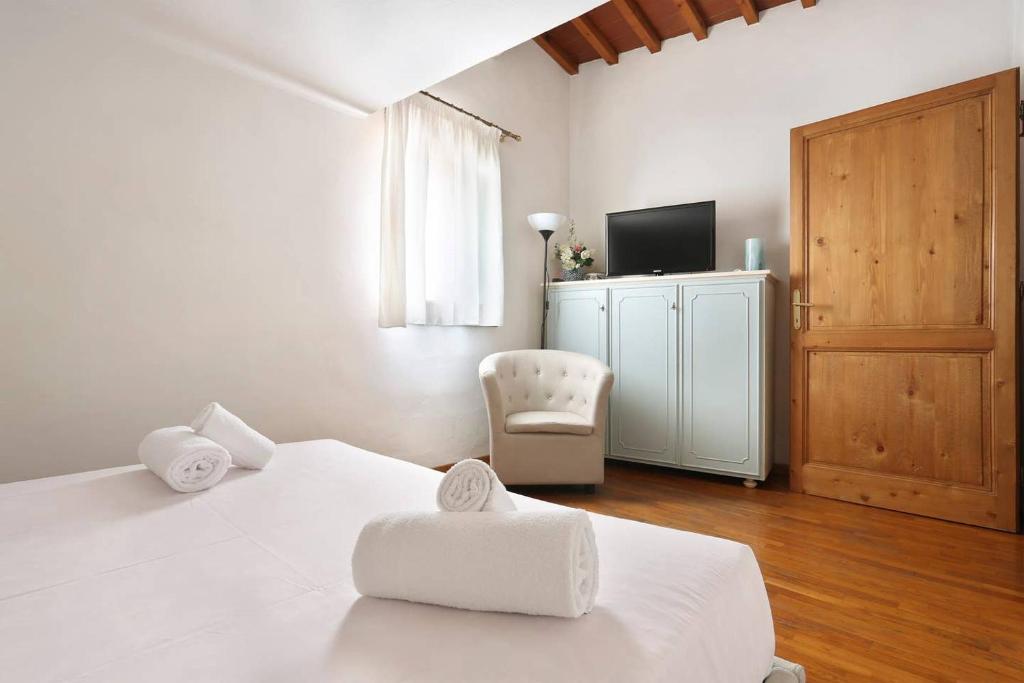 Posteľ alebo postele v izbe v ubytovaní Appartamento La Terrazza Firenze centro storico