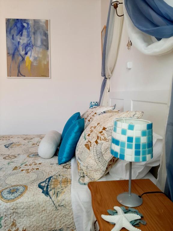 Posteľ alebo postele v izbe v ubytovaní Atelier Tina Art Home