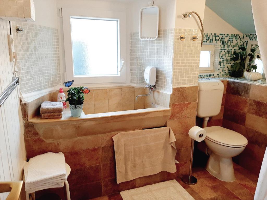 Kúpeľňa v ubytovaní Atelier Tina Art Home