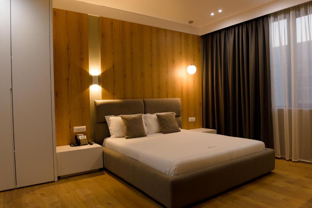 Postel nebo postele na pokoji v ubytování Hotel One