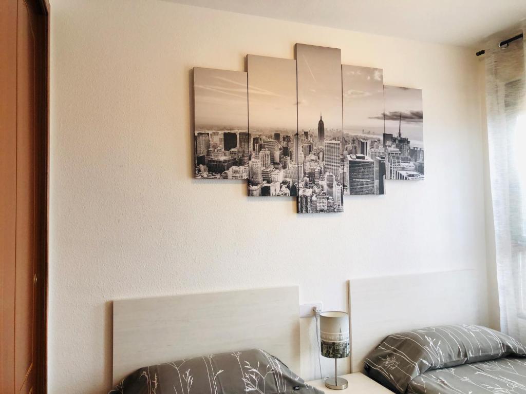 Posteľ alebo postele v izbe v ubytovaní Apartamento Arosa Playa