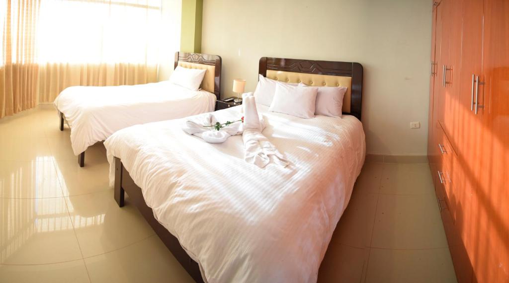 Cama o camas de una habitación en Villas House
