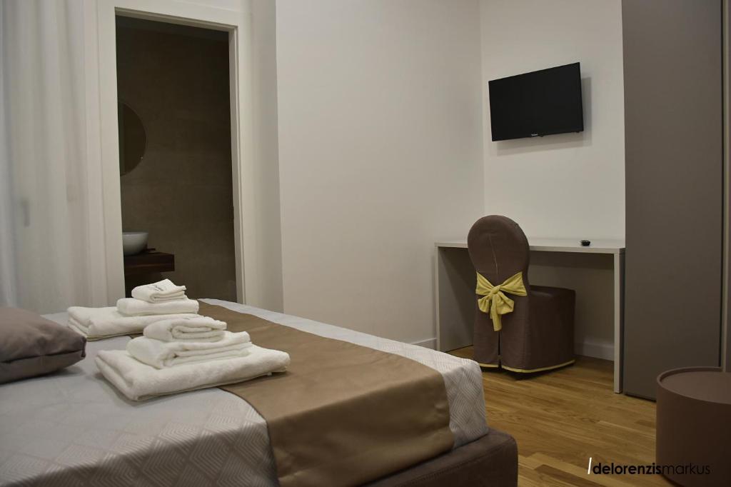 TV a/nebo společenská místnost v ubytování Les 3 Chambres