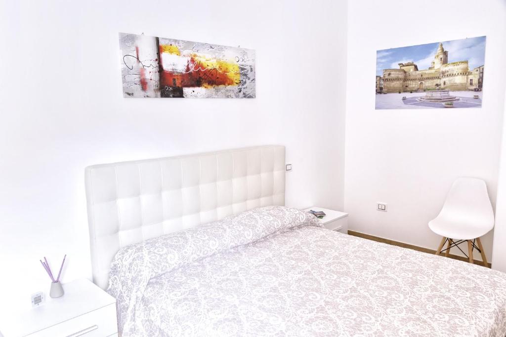 Postel nebo postele na pokoji v ubytování Dimora Del Vasto