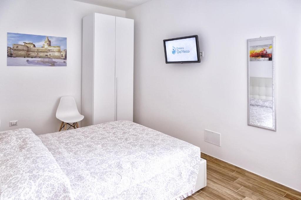 Postel nebo postele na pokoji v ubytování Dimora Del Vasto