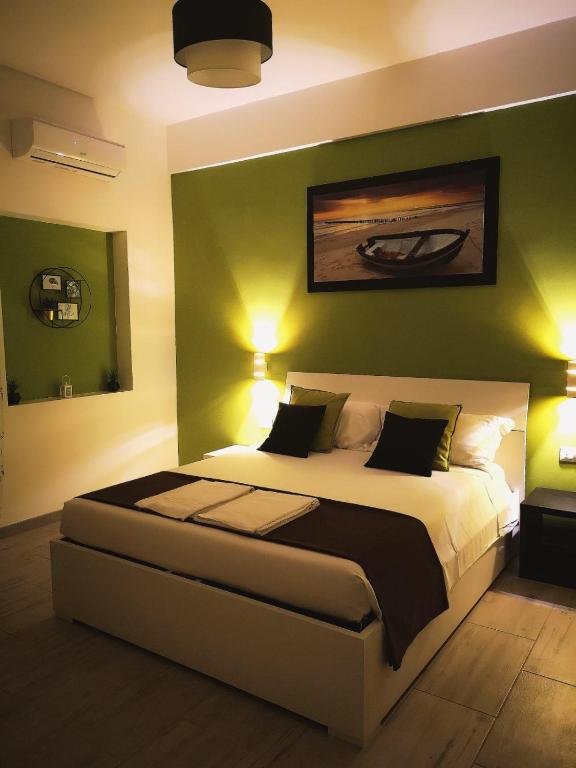 A bed or beds in a room at The Royals