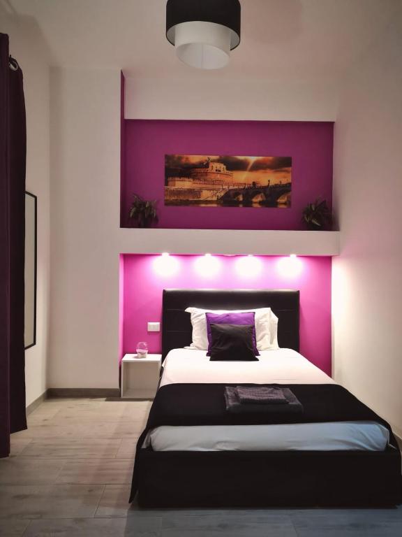 A bed or beds in a room at The Royals
