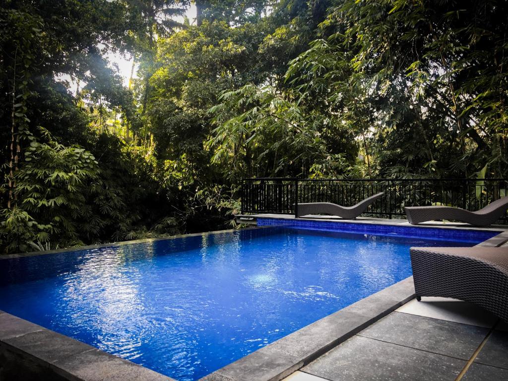 Bazén v ubytování Umah Kayu Ubud nebo v jeho okolí