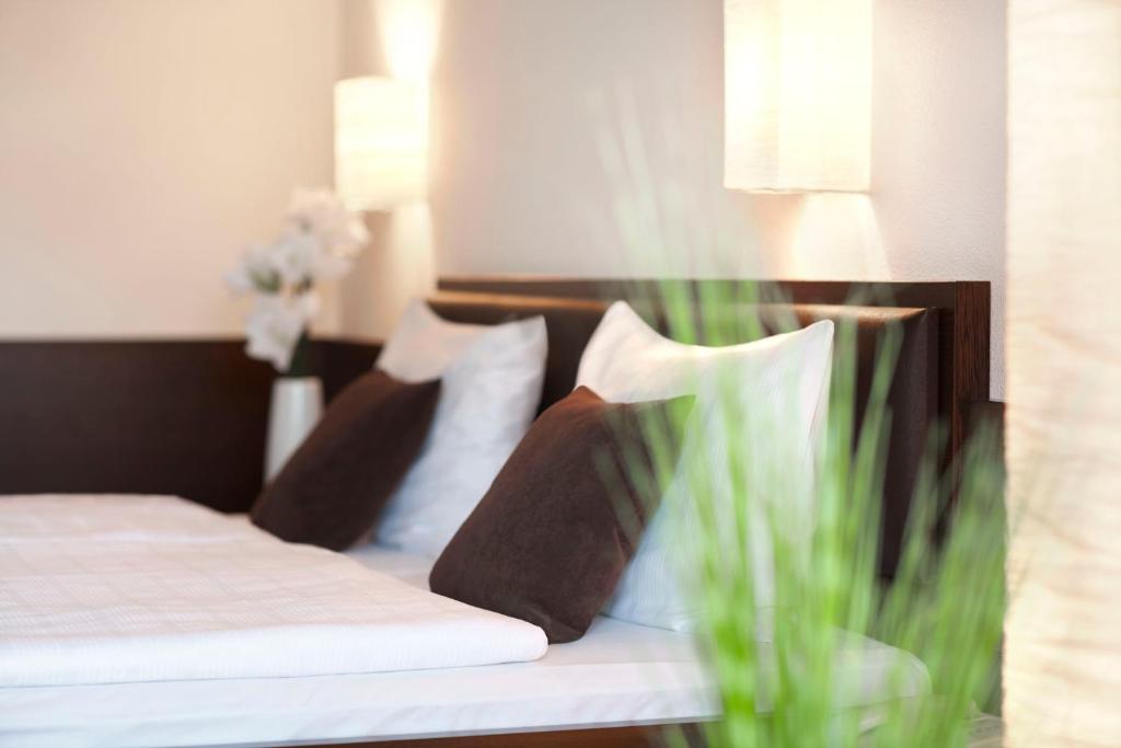Postel nebo postele na pokoji v ubytování nordica Hotel Berlin