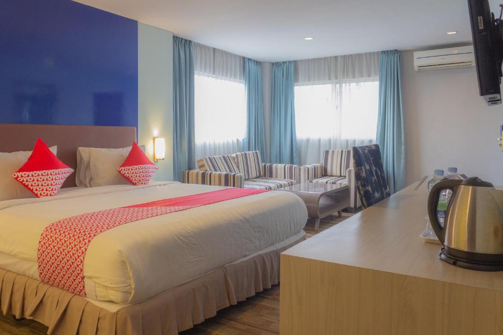 Cama o camas de una habitación en Collection O 7 Hotel Melawai