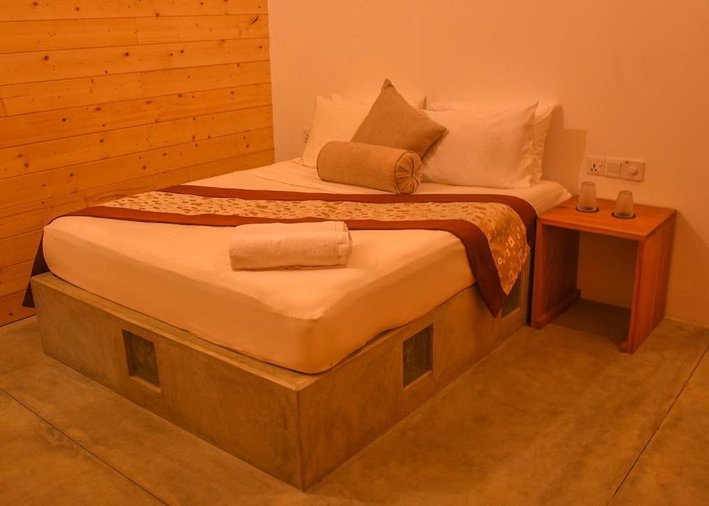Postel nebo postele na pokoji v ubytování Trinco Relax Hut