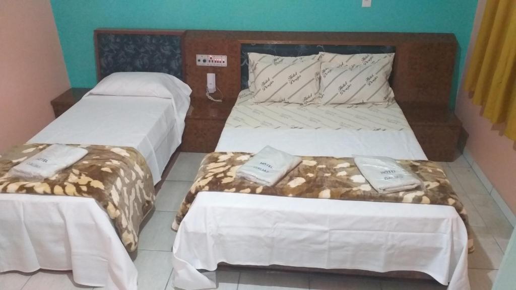 Postel nebo postele na pokoji v ubytování Hotel Dalias