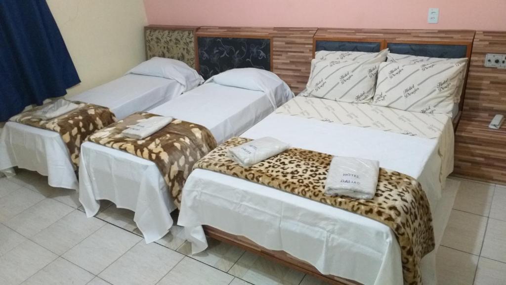 Postel nebo postele na pokoji v ubytování Hotel Dalias