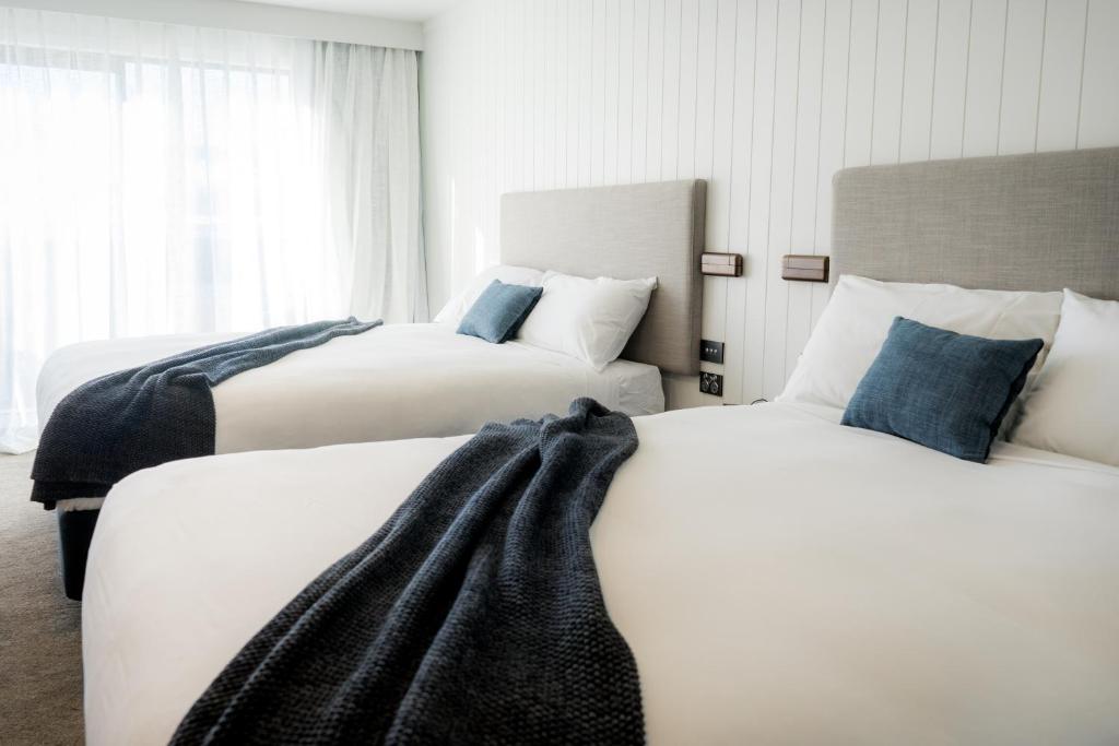 Postel nebo postele na pokoji v ubytování Kamana Lakehouse