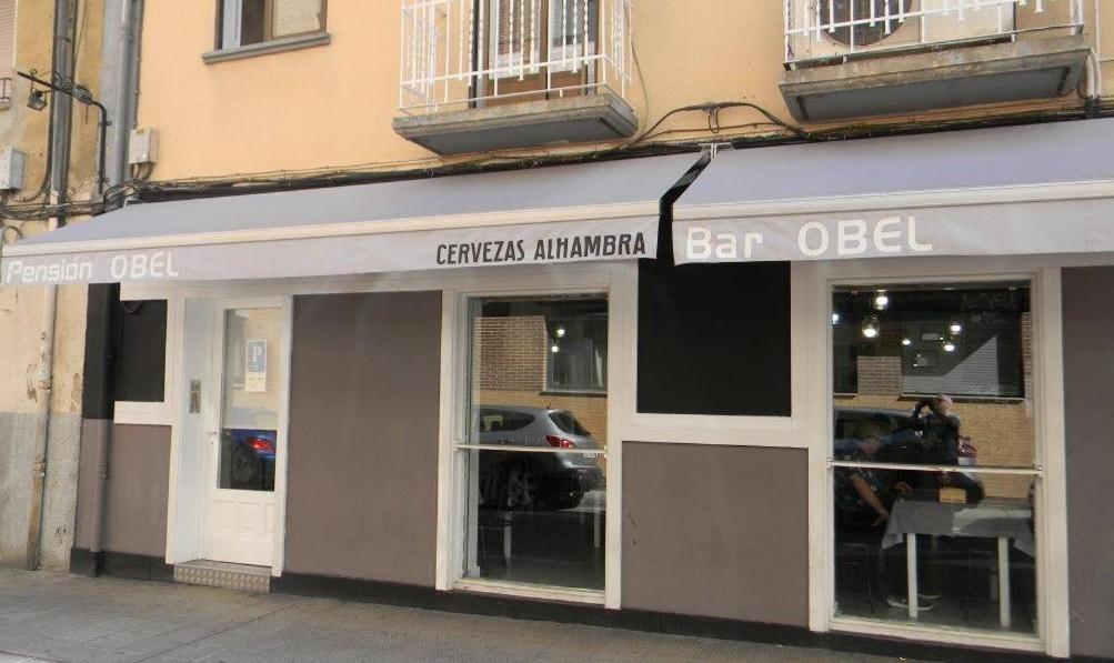a store front of a bar called bar obilli at Pension Obel in Villava