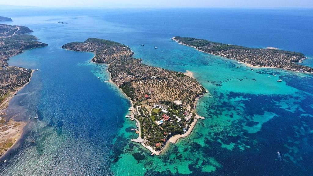 an aerial view of an island in the ocean at Oliviera Private Island Hotel - Kalem Island in Kalem Adasi