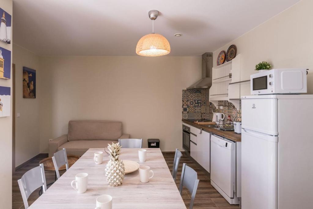 Kuchyň nebo kuchyňský kout v ubytování LovelyStay - Sweet Escape I - Terrace