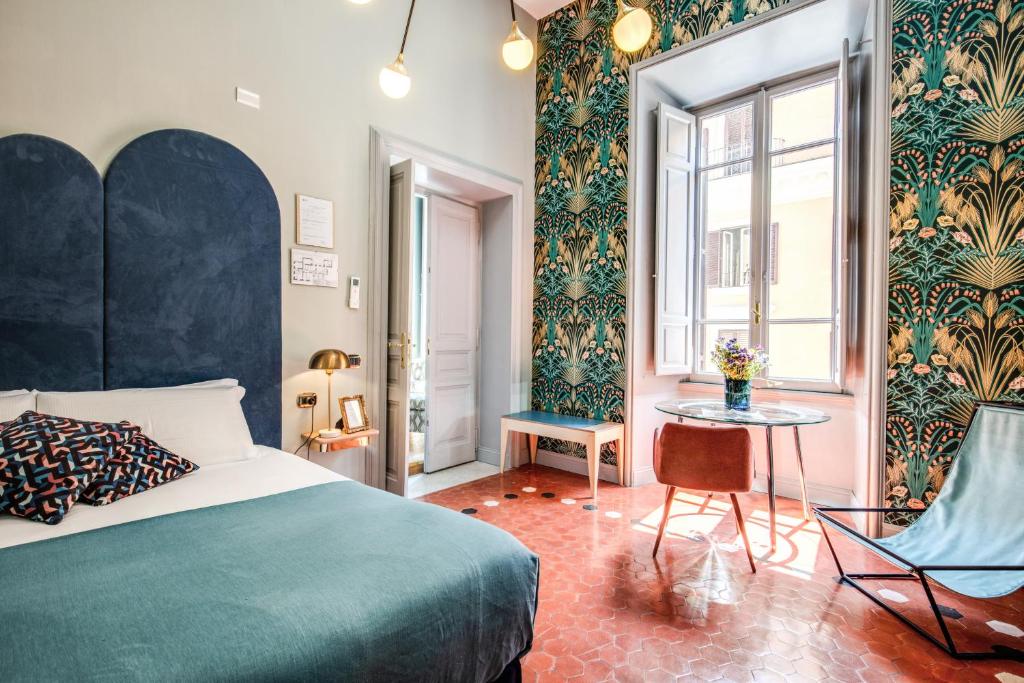 A bed or beds in a room at Glance in Rome