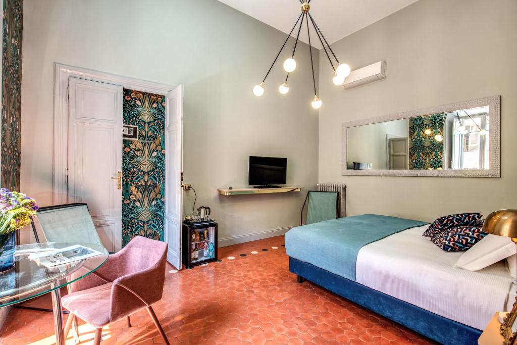 A bed or beds in a room at Glance in Rome