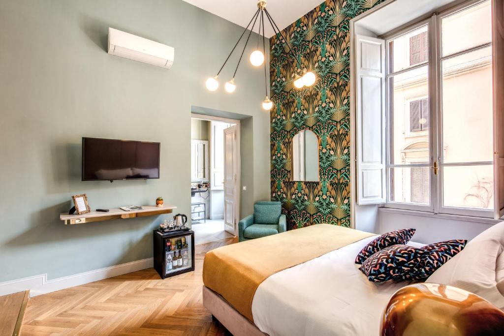 A bed or beds in a room at Glance in Rome