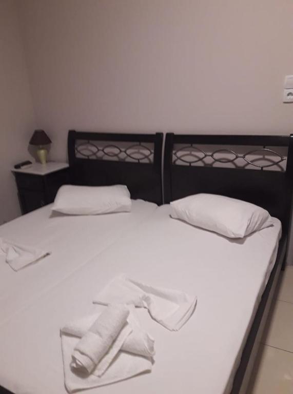 Postel nebo postele na pokoji v ubytování Hotel Pegasos