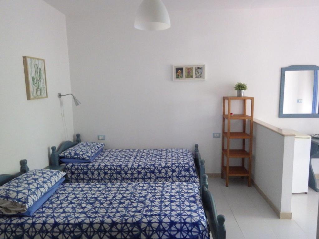 Postel nebo postele na pokoji v ubytování B&B Masseria Liberatore