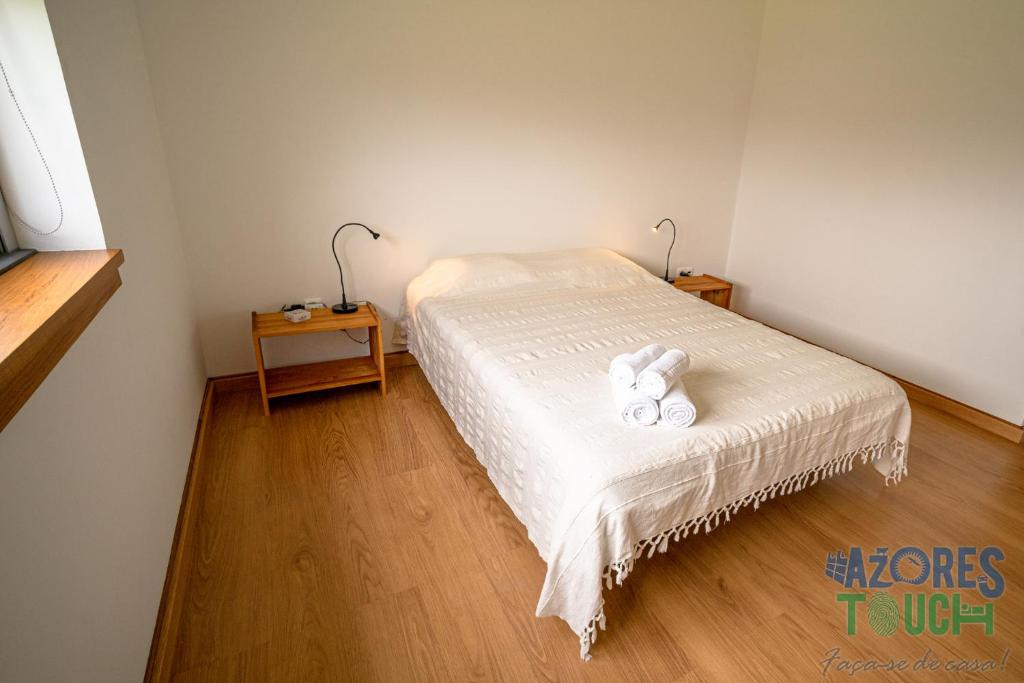 Postel nebo postele na pokoji v ubytování Casa da Barra