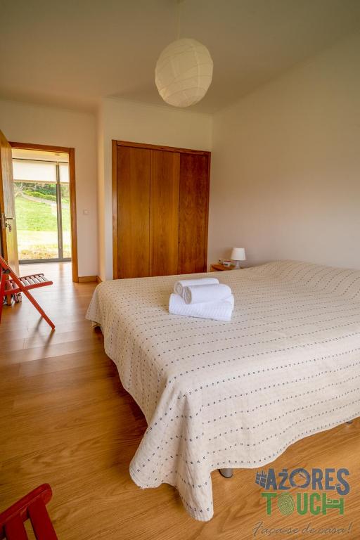 Postel nebo postele na pokoji v ubytování Casa da Barra