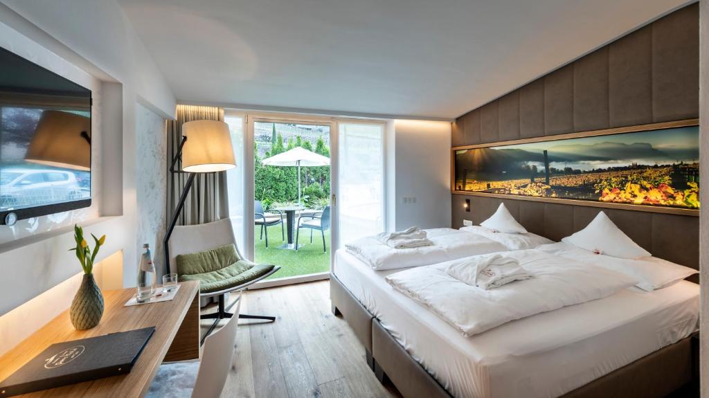 Postel nebo postele na pokoji v ubytování Parc Hotel Am See