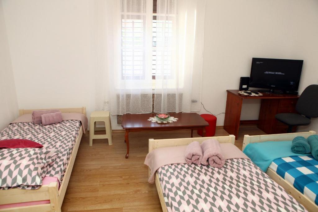 Postel nebo postele na pokoji v ubytování Apartma Grof
