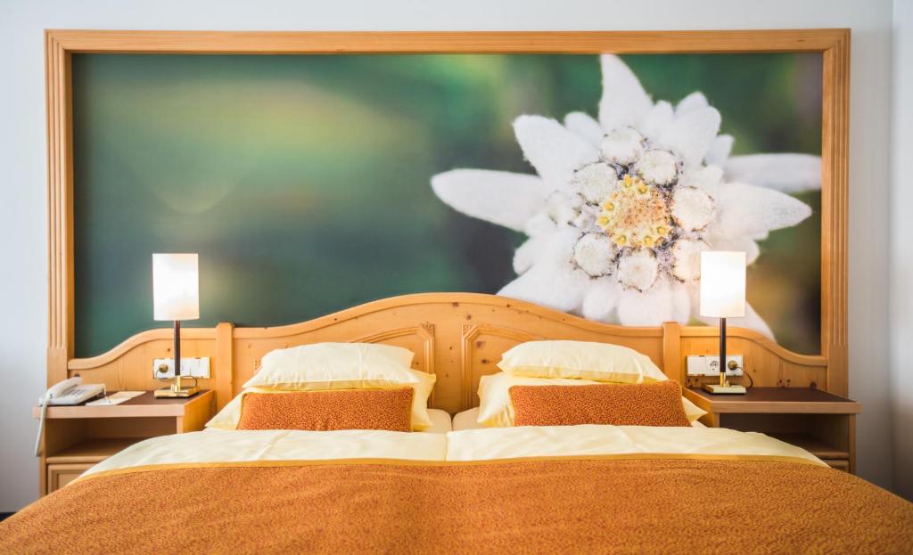 Postel nebo postele na pokoji v ubytování EUROPÄISCHER HOF Aktivhotel & Spa