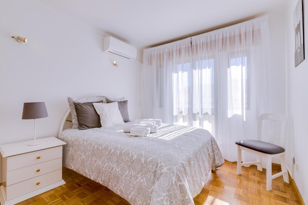 Uma cama ou camas num quarto em Palma - 4 bed near the city center - Faro