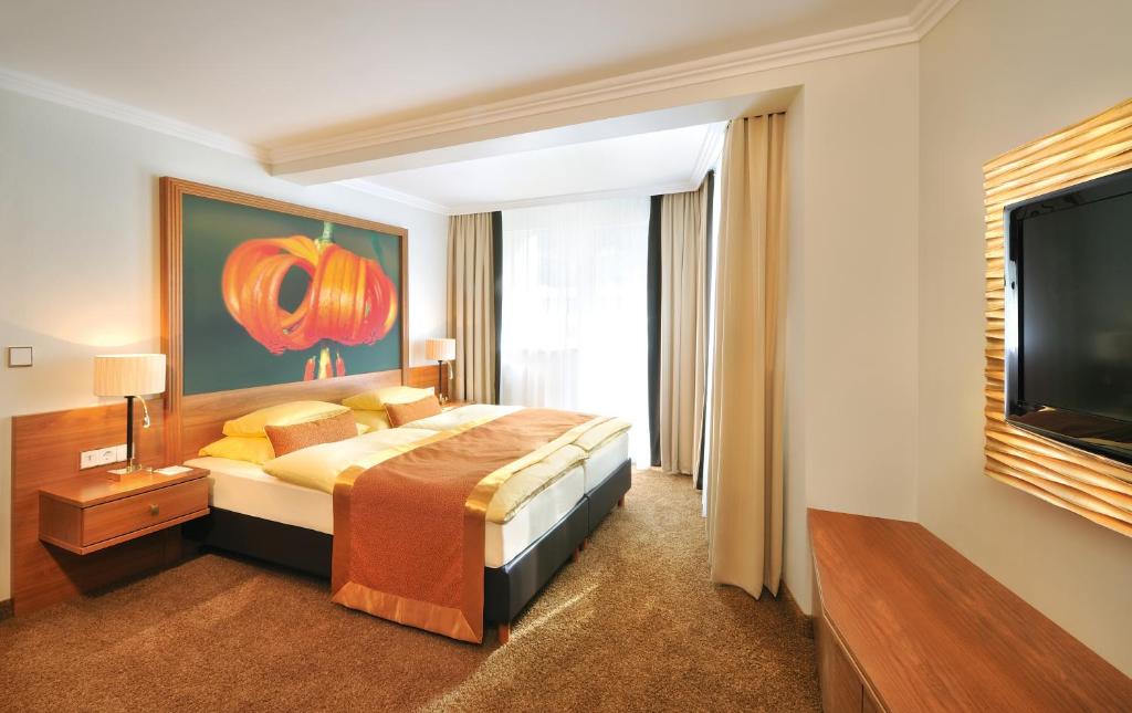 Postel nebo postele na pokoji v ubytování EUROPÄISCHER HOF Aktivhotel & Spa