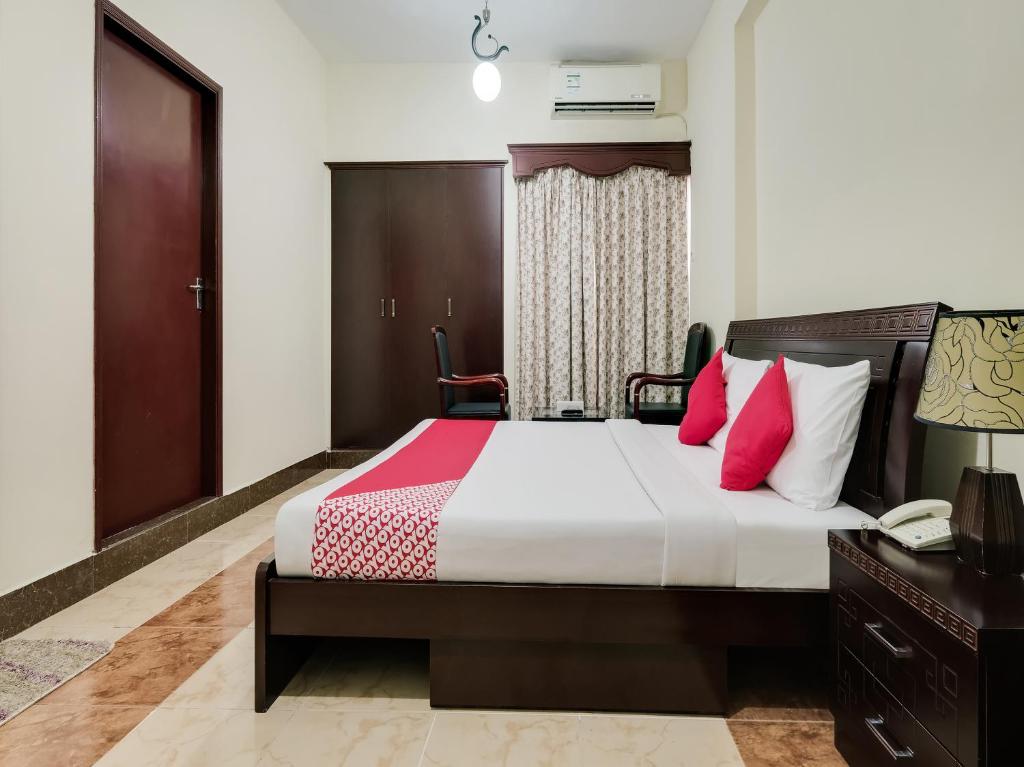 Postel nebo postele na pokoji v ubytování Al Rayan Hotel