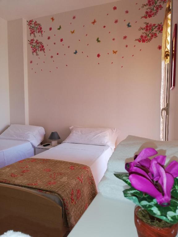 Postel nebo postele na pokoji v ubytování Mirage B&B