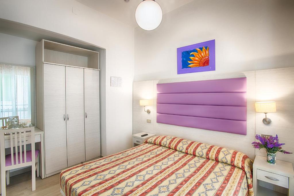 Postel nebo postele na pokoji v ubytování Hotel Meritime