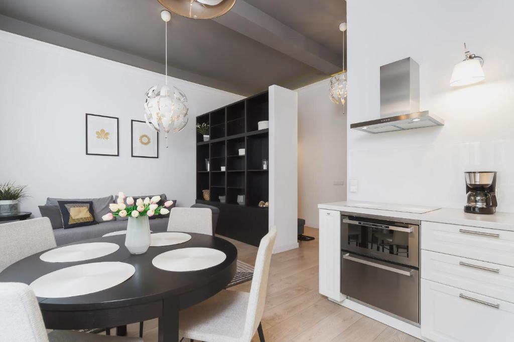 Kuchyň nebo kuchyňský kout v ubytování Apartment Krakow Arianska by Renters Prestige