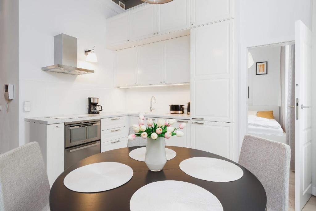 Kuchyň nebo kuchyňský kout v ubytování Apartment Krakow Arianska by Renters Prestige