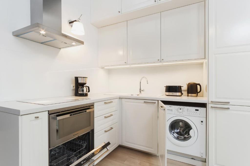 Kuchyň nebo kuchyňský kout v ubytování Apartment Krakow Arianska by Renters Prestige