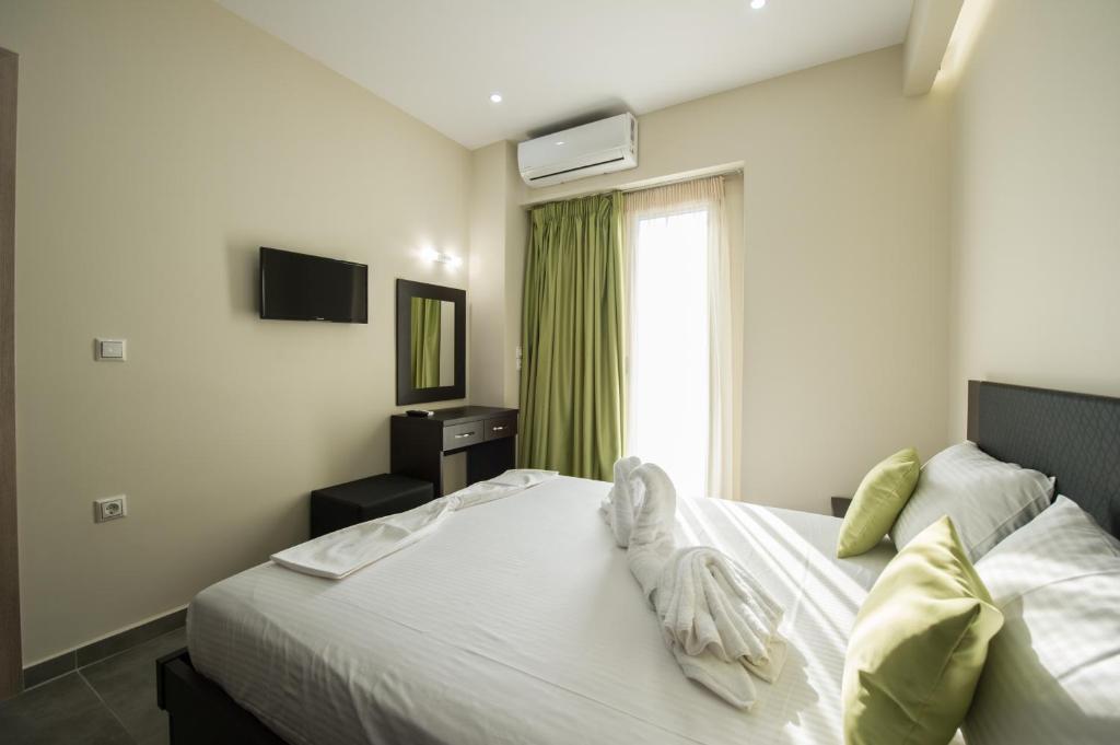 Postel nebo postele na pokoji v ubytování Tresor Apartments
