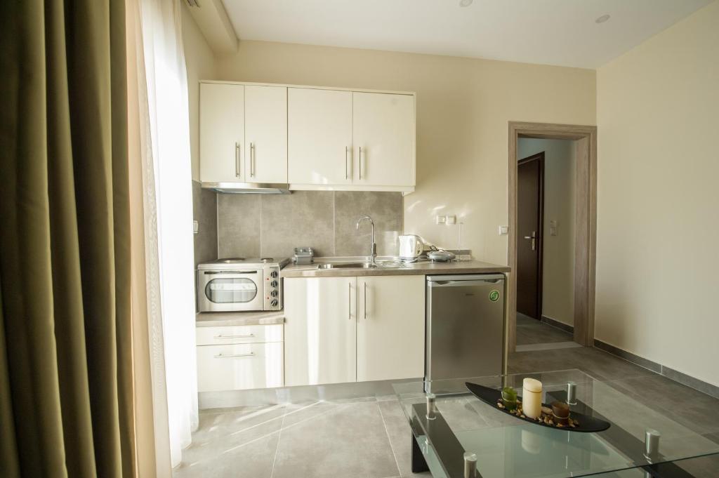 Kuchyň nebo kuchyňský kout v ubytování Tresor Apartments