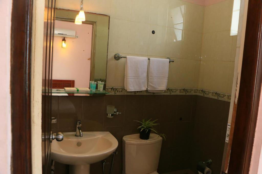 Koupelna v ubytování Lafala Hotel & Service Apartment