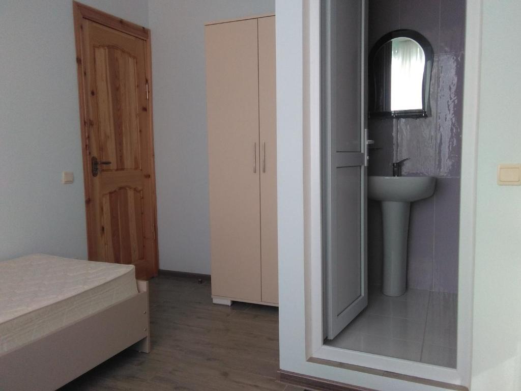 Postel nebo postele na pokoji v ubytování Str.Agmashenebeli 548