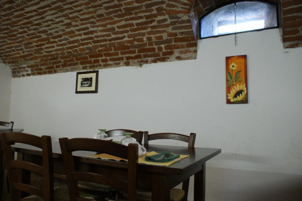 Reštaurácia alebo iné gastronomické zariadenie v ubytovaní B&B La Braida